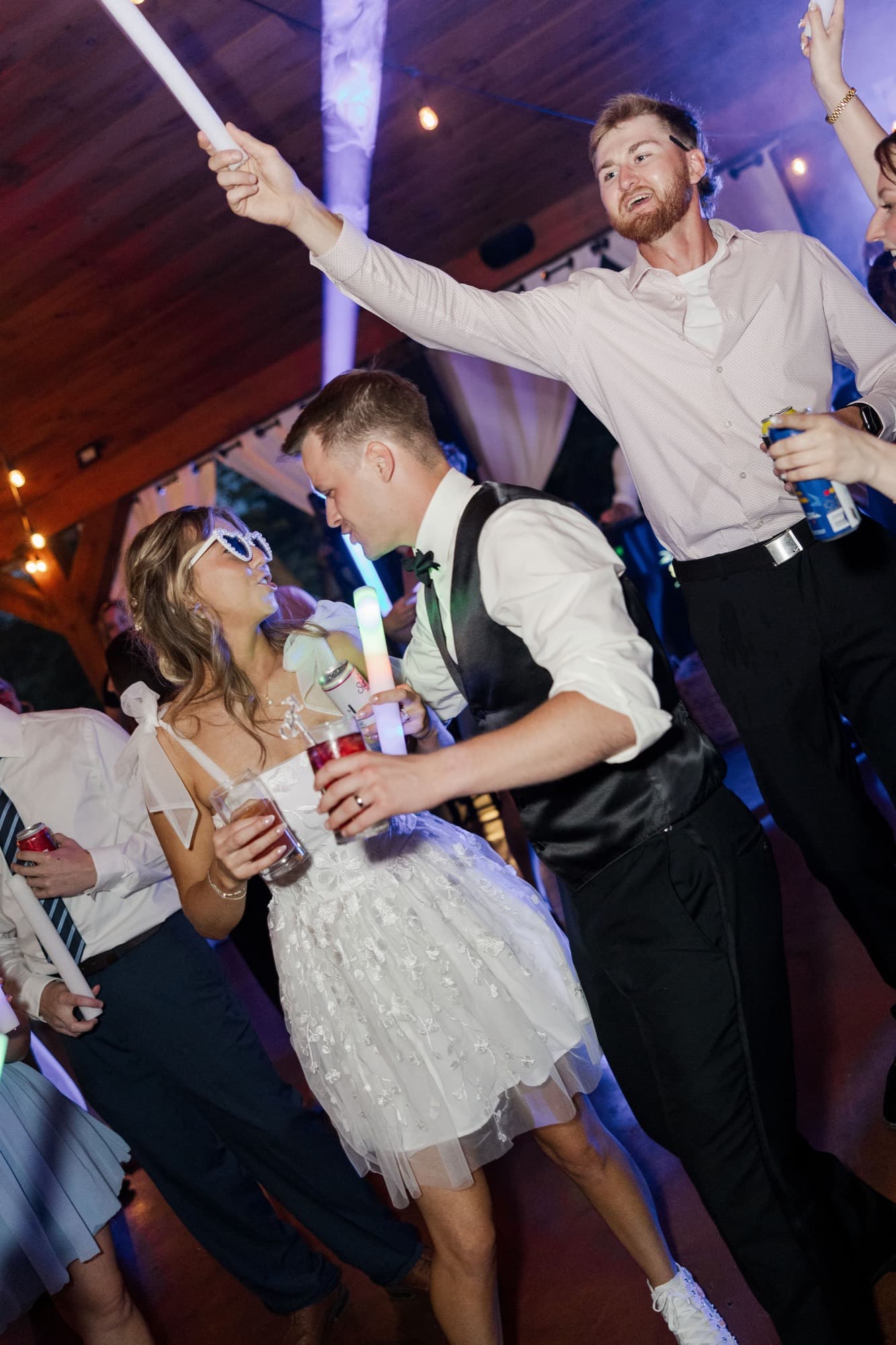 Couple dancing with glow sticks