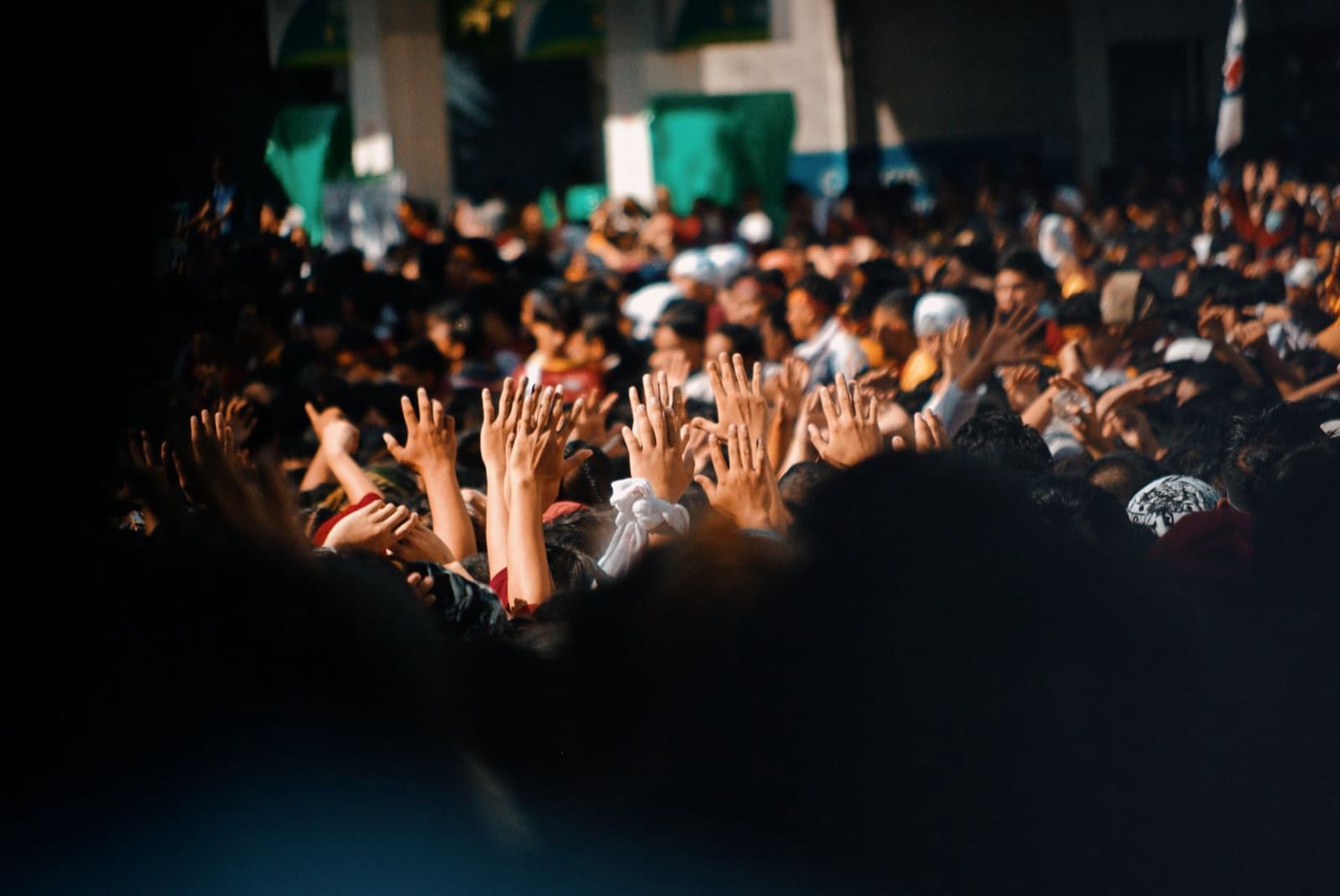 Crowd with hands raised